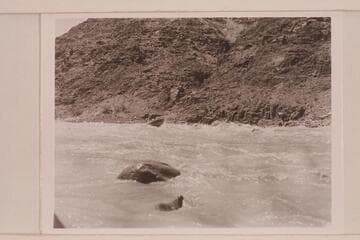 Jimmy Jordan piloting the "June Bug" in Dubendorff Rapid.  Macdonald is riding with him