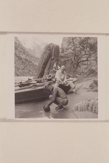 Ballard Atherton and Joe Desloge polish dishes at camp on right bank below the mouth of Supai Creek